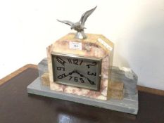 An Art Deco period marble mantel clock by F. Marti, the silvered dial with arabic chapter ring, twin