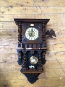 A late Victorian walnut cased regulator wall clock, the case surmounted by an associated eagle