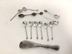 A set of six Sheffield silver coffee spoons (combined: 41g), a silver handled shoe horn and group of