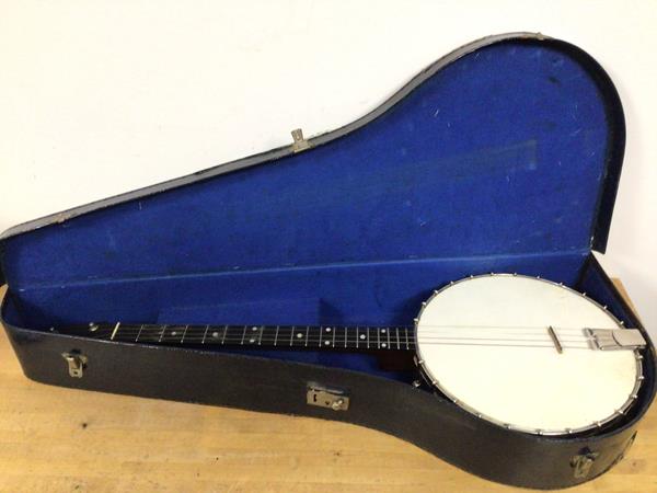 A banjo with foliate engraving, in vintage travelling case (80cm)