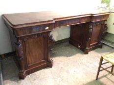 A 19thc mahogany sideboard, the inverted breakfront top with three frieze drawers, on two pedestals,