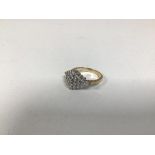 A 9ct gold navette shaped ring, set diamond chips (P) (4.13g)