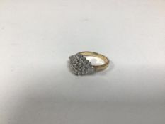 A 9ct gold navette shaped ring, set diamond chips (P) (4.13g)