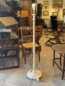 A 20thc white painted floor lamp of classical design, the turned tapering and reeded upright