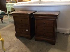 A pair of late 20thc mahogany bedside chests, the square moulded top above a concealed cushion