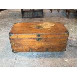 A 19thc camphorwood trunk, the hinged lid with brass bound corners, centred by a brass plaque