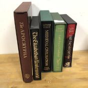 A group of five Folio Society publications including the Apochypha, The Elizabethan Underworld,