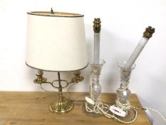 A group of three table lamps, two cut glass, possibly converted from candlesticks, one, brass two
