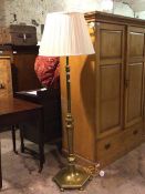 An Edwardian cast brass telescopic standard lamp, with hexagonal base, together with a decorative