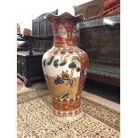 A large Kutani style modern floor standing vase, the flared scalloped rim above a baluster shaped