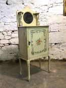 Early 20th century French cream and floral wash stand, the raised back with mirror and open