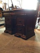 A Pair of mahogany bedside chests, with moulded tops over cushion drawer and two drawers under,