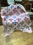A 1920's pink patchwork comfy quilt, 198cm x 190cm