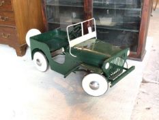A vintage Child's peddle car, modeled as a Willis Jeep, L100cm