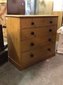 A Victorian pine chest, fitted with two short and three long drawers, raised on plinth base