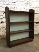 A 20th century oak floor standing open bookcase with two shelves, H90cm, W74cm, D20cm