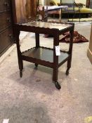 A Quality two tier drinks trolley of small proportions, the scalloped tray tops raised on square