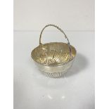 A Victorian Sheffield silver swing handled sweetmeat basket of half lobed design (5cm x d.9cm) (72.