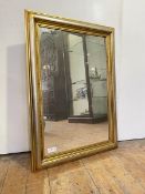 Wall hanging mirror of rectangular form, enclosed by a gilt and silvered frame, H91cm x W65cm