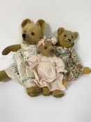 A collection of three mohair straw filled jointed teddy bears with stitched nose and inset glass