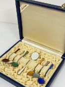 A set of six silver gilt enamelled coffee spoons, stamped 925, complete with original H. Gams-