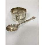 A Glasgow silver napkin ring (a/f), engraved with intials AMWSC and a Continental white metal