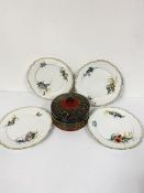 A set of four china floral decorated dessert plates with various flowers etc. and an Eastern
