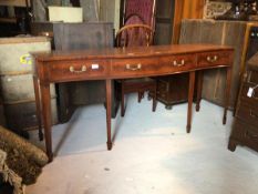 A quality reproduction Georgian style inlaid mahogany sideboard of serpentine outline, with three