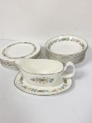 A Royal Doulton Pastorale part dinner set including eight floral decorated and silver bordered salad