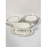 A Royal Doulton Pastorale part dinner set including eight floral decorated and silver bordered salad