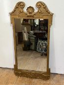 A George III reproduction gilt composition rectangular wall mirror with shell centre surmount