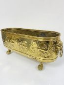A brass rectangular rounded angle twin lion mask handled planter decorated with chased stag, hound