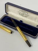 An American Watermans yellow metal engine turned presentation fountain pen to A Fergus Taylor, 3rd