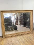 A large rectangular wall hanging mirror, enclosed by a cavetto moulded reclaimed pine frame H97cm