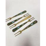 A set of five Russian silver enamelled butter forks stamped indistinctly (9cm) (29.5g)
