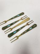 A set of five Russian silver enamelled butter forks stamped indistinctly (9cm) (29.5g)