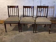 Set of Three Regency dining chairs, with inlaid crest rail over wheat sheaf splats and upholstered