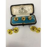 A set of three 9ct gold studs (2.25g), and a pair of faceted citrine yellow metal mounted circular