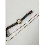 A 9ct gold cased lady's 1920s style wristwatch with enamel dial (a/f) and roman numerals, on woven
