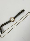 A 9ct gold cased lady's 1920s style wristwatch with enamel dial (a/f) and roman numerals, on woven