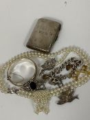 A paste pearl two strand necklace, a marcasite spray brooch, a jet style white metal mounted brooch,