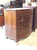 A 19thc bow front mahogany chest of drawers, with three short drawers above three graduated drawers,