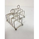 A pair of Birmingham silver miniature four division toast racks on bun feet (7cm x 8cm x 4cm) (87.