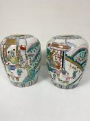 A pair of modern baluster ginger jars, missing covers, decorated with Canton style figure scenes (