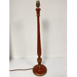 A treen red and gilt lacquered candlestick baluster table lamp on footed circular moulded base (