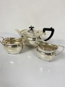 A three piece Epns tea service with gadroon border, comprising teapot, two handled sugar basin and