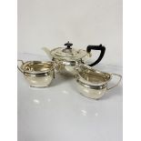 A three piece Epns tea service with gadroon border, comprising teapot, two handled sugar basin and