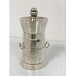 A silver Capstan style pepper grinder in the form of a barrel with twin handles to side, on circular