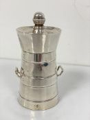 A silver Capstan style pepper grinder in the form of a barrel with twin handles to side, on circular