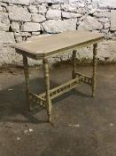 Edwardian cream and gilt painted centre table, the top with canted corners over turned supports